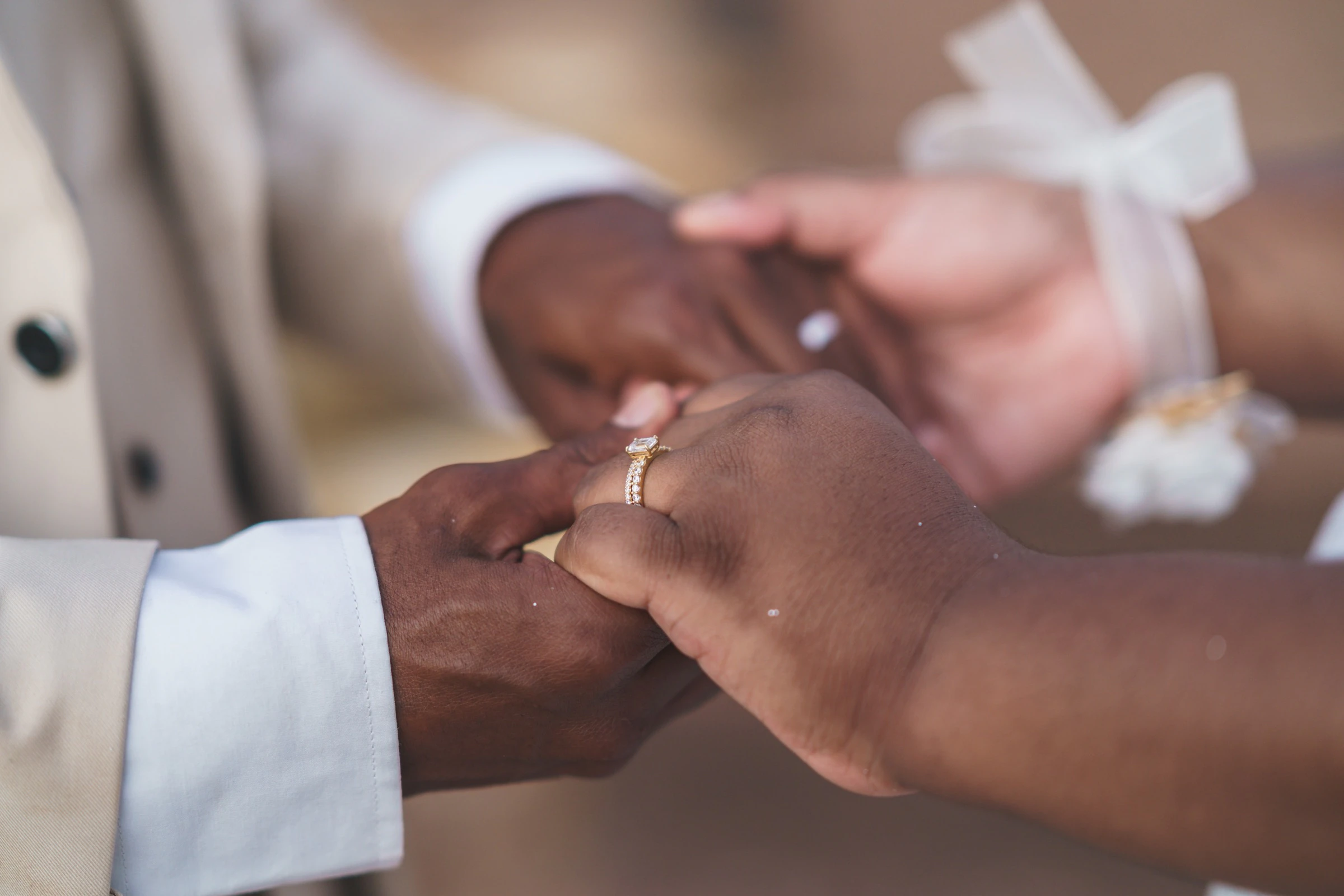 Wedding rings and hands before the ceremony